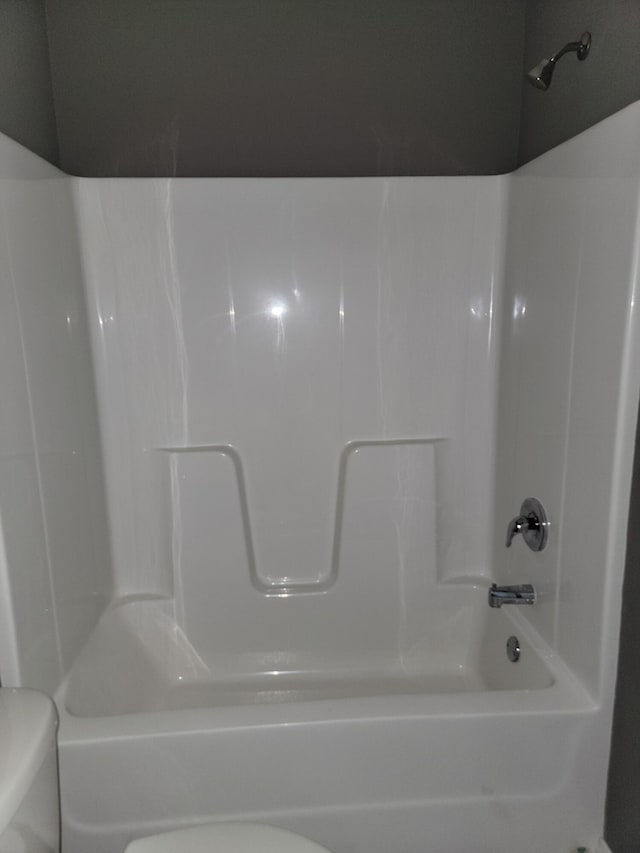 100 Hawthorn Ave, Rogersville, MO 65742 - bathroom featuring toilet and shower / washtub combination