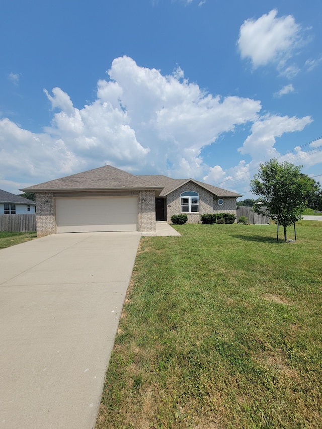 100 Hawthorn Ave, Rogersville, MO 65742 - single story home with brick siding, an attached garage, and concrete driveway