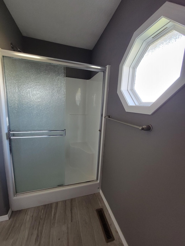 100 Hawthorn Ave, Rogersville, MO 65742 - full bathroom with wood finished floors and a stall shower