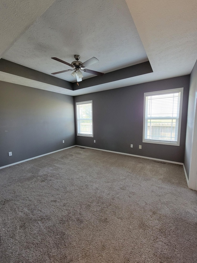 100 Hawthorn Ave, Rogersville, MO 65742 - empty room with a textured ceiling, carpet flooring, and ceiling fan
