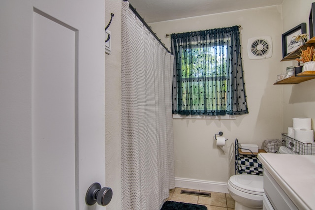 135 Roark Ave, Branson, MO 65616 - bathroom featuring tile patterned floors, vanity, and curtained shower
