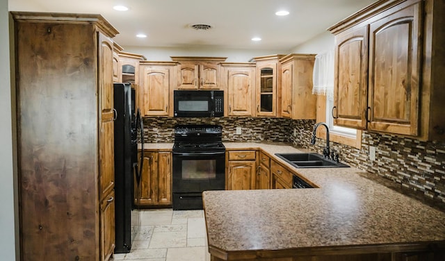 22783 Lawrence Unit 1210, Aurora, MO 65605 - kitchen with black appliances, recessed lighting, a peninsula, tasteful backsplash, and glass insert cabinets