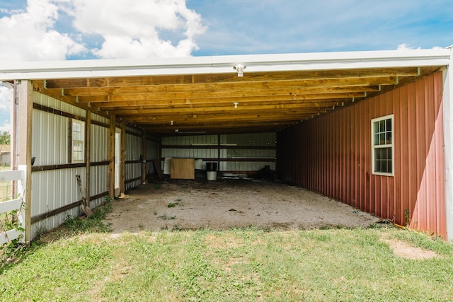 22783 Lawrence Unit 1210, Aurora, MO 65605 - view of car parking with an exterior structure