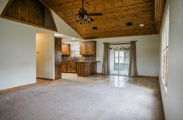 22783 Lawrence Unit 1210, Aurora, MO 65605 - unfurnished living room with ceiling fan, light carpet, high vaulted ceiling, wood ceiling, and recessed lighting