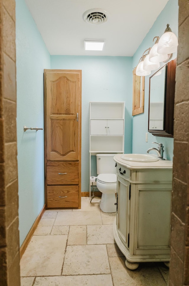 22783 Lawrence Unit 1210, Aurora, MO 65605 - half bath with vanity and stone tile floors