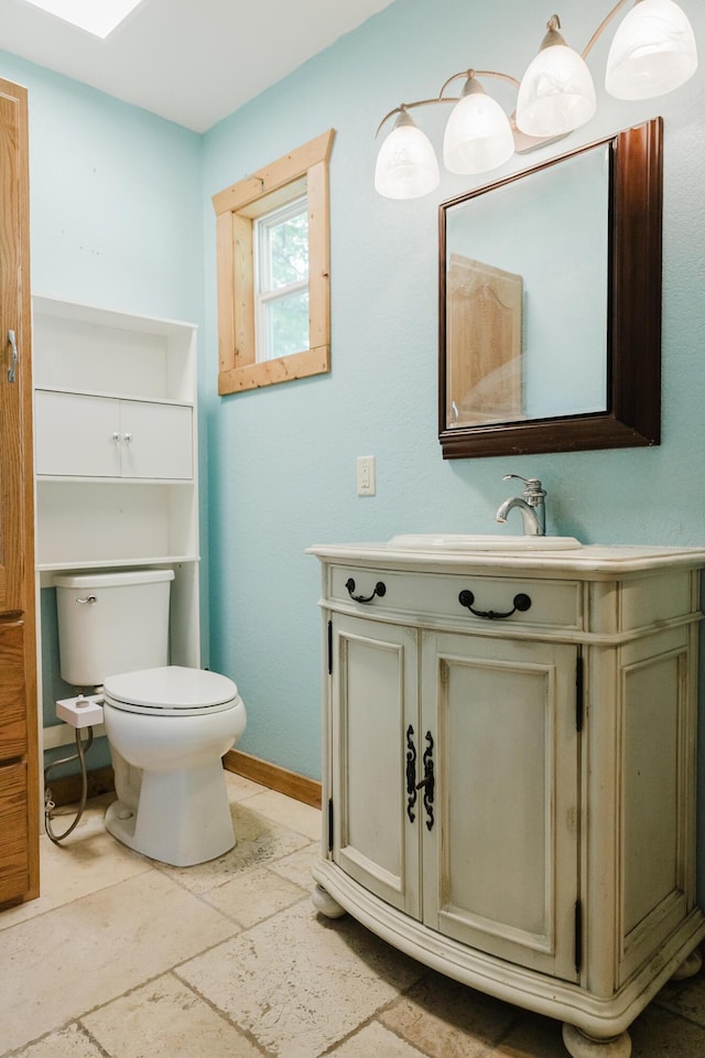 22783 Lawrence Unit 1210, Aurora, MO 65605 - half bathroom featuring vanity and stone tile flooring