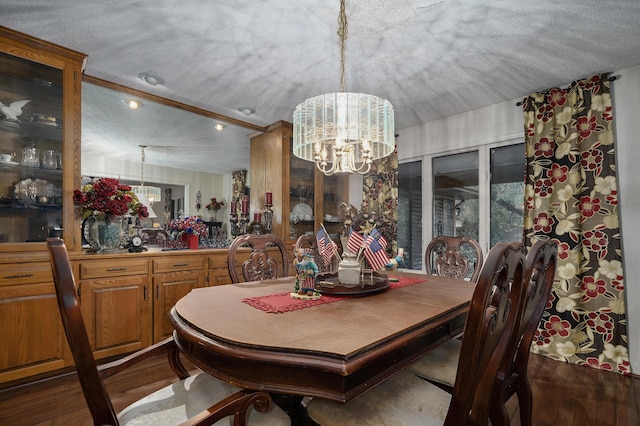 667 S Broadview Dr, Springfield, MO 65809 - dining area with a chandelier, recessed lighting, dark wood-style flooring, and a textured ceiling