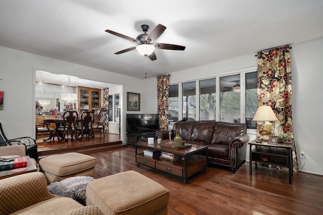 667 S Broadview Dr, Springfield, MO 65809 - living area with a ceiling fan, wood finished floors, and a chandelier