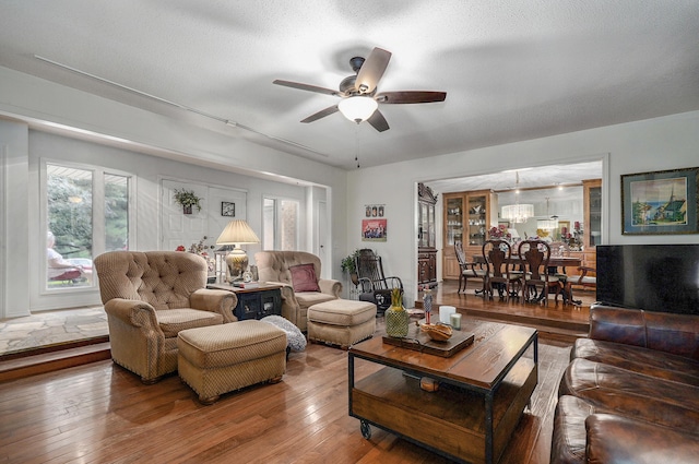 667 S Broadview Dr, Springfield, MO 65809 - living room with ceiling fan, hardwood / wood-style floors, and plenty of natural light