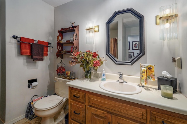 667 S Broadview Dr, Springfield, MO 65809 - bathroom with vanity and toilet
