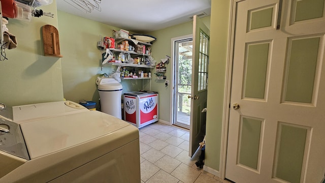 5143 State Highway 95, Drury, MO 65638 - laundry area featuring washing machine and dryer and light tile patterned floors