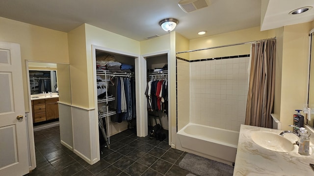 5143 State Highway 95, Drury, MO 65638 - full bathroom with tile patterned flooring, vanity, shower / bathtub combination with curtain, and a spacious closet