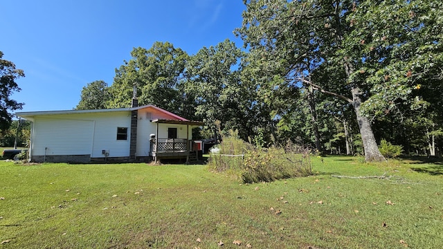 5143 State Highway 95, Drury, MO 65638 - view of grassy yard featuring a wooden deck