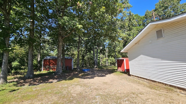 5143 State Highway 95, Drury, MO 65638 - view of yard with a storage shed