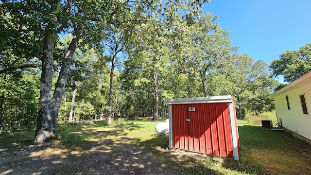 5143 State Highway 95, Drury, MO 65638 - view of grassy yard featuring a storage unit