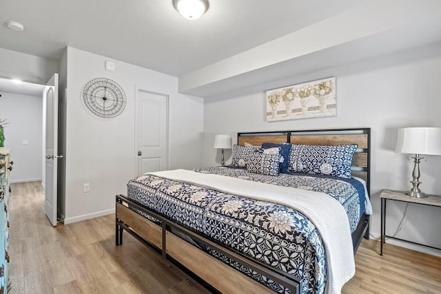 310 W College St, Branson, MO 65616 - bedroom featuring wood finished floors