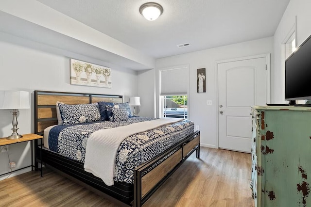 310 W College St, Branson, MO 65616 - bedroom with light wood-style floors