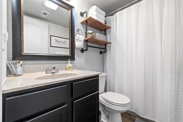 310 W College St, Branson, MO 65616 - full bathroom with vanity and a shower with shower curtain