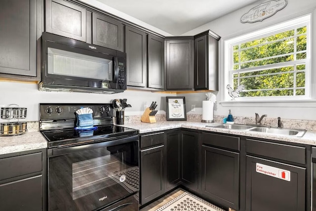 310 W College St, Branson, MO 65616 - kitchen with black appliances and a sink