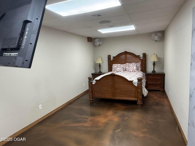 318 Fox Fire Ct, Joplin, MO 64801 - bedroom featuring concrete floors and a drop ceiling