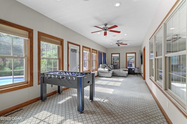 318 Fox Fire Ct, Joplin, MO 64801 - recreation room featuring carpet flooring, a ceiling fan, healthy amount of natural light, recessed lighting, and lofted ceiling