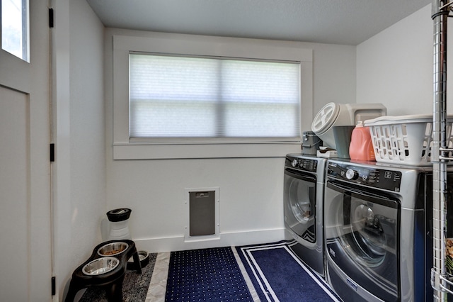 1508 S Moffet Ave, Joplin, MO 64804 - laundry room featuring washing machine and dryer and baseboards