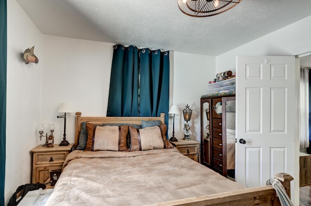 1508 S Moffet Ave, Joplin, MO 64804 - bedroom with a textured ceiling and vaulted ceiling
