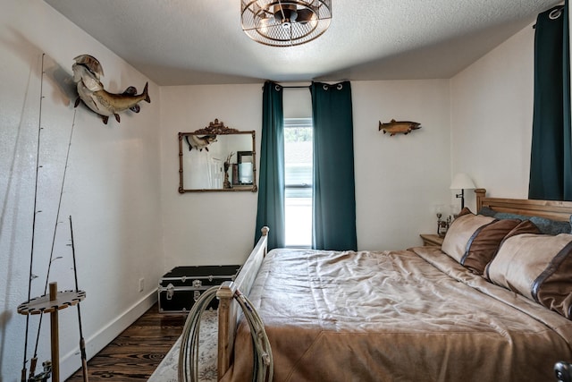 1508 S Moffet Ave, Joplin, MO 64804 - bedroom with dark wood-type flooring and a textured ceiling