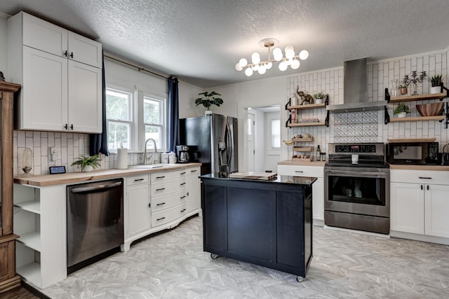 1508 S Moffet Ave, Joplin, MO 64804 - kitchen featuring open shelves, black appliances, wall chimney exhaust hood, decorative backsplash, and white cabinetry