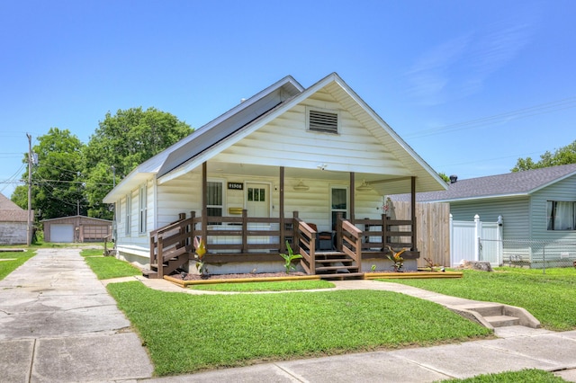 1508 S Moffet Ave, Joplin, MO 64804 - bungalow with a porch and an outdoor structure