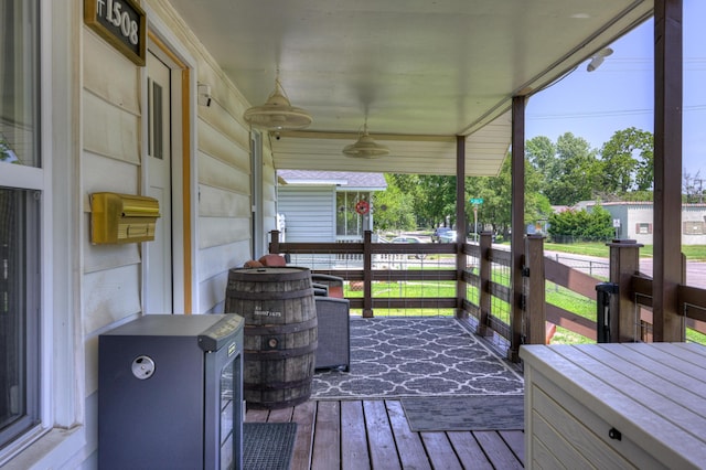 1508 S Moffet Ave, Joplin, MO 64804 - wooden porch featuring ceiling fan