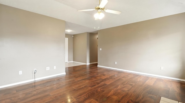 205 W Hunter Dr, Nixa, MO 65714 - empty room with a ceiling fan and wood finished floors
