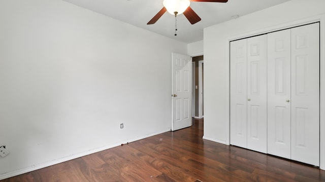 205 W Hunter Dr, Nixa, MO 65714 - unfurnished bedroom with wood finished floors, a closet, and ceiling fan