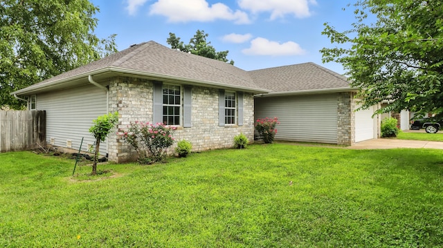 205 W Hunter Dr, Nixa, MO 65714 - view of front facade featuring a garage, driveway, roof with shingles, and stone siding