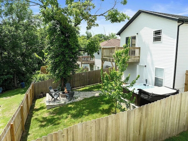 302 W College St, Branson, MO 65616 - fenced backyard with a fire pit and a balcony