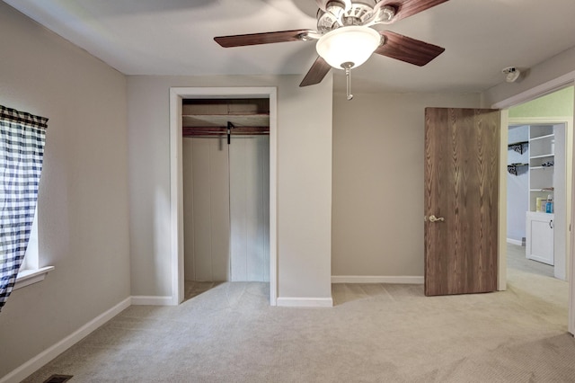 1027 S Orner St, Carthage, MO 64836 - unfurnished bedroom with carpet flooring, a closet, and a ceiling fan