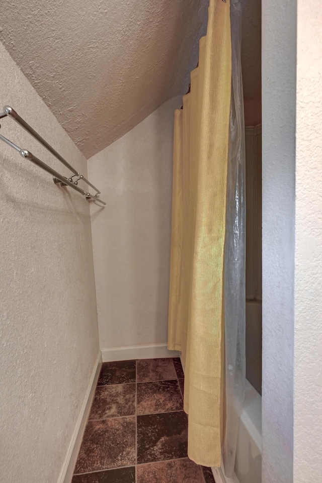1027 S Orner St, Carthage, MO 64836 - walk in closet with vaulted ceiling