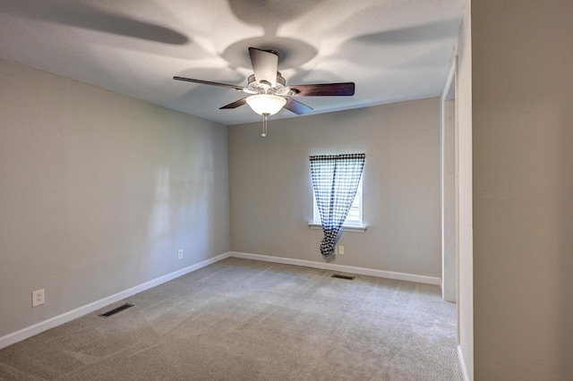 1027 S Orner St, Carthage, MO 64836 - unfurnished room with carpet and ceiling fan