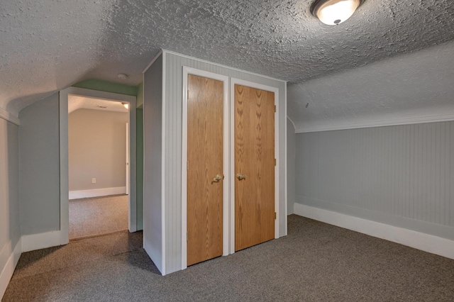 1027 S Orner St, Carthage, MO 64836 - bonus room featuring carpet flooring and a textured ceiling
