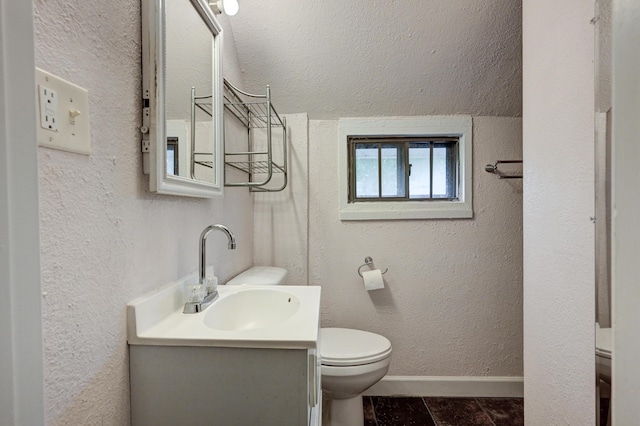 1027 S Orner St, Carthage, MO 64836 - bathroom with vanity and a textured wall