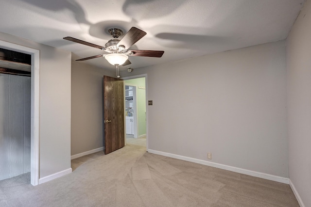 1027 S Orner St, Carthage, MO 64836 - unfurnished bedroom with light colored carpet, a ceiling fan, and a closet