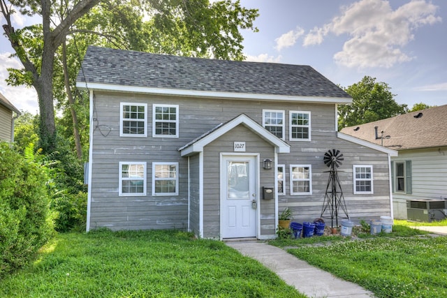 1027 S Orner St, Carthage, MO 64836 - view of front facade featuring a front yard