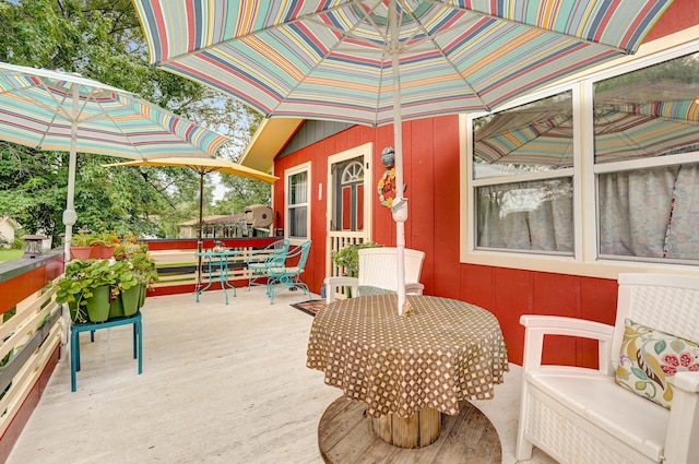 1648 N Yates Ave, Springfield, MO 65803 - wooden deck with outdoor dining area