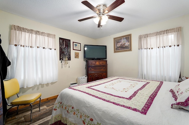 1648 N Yates Ave, Springfield, MO 65803 - bedroom featuring wood finished floors and ceiling fan
