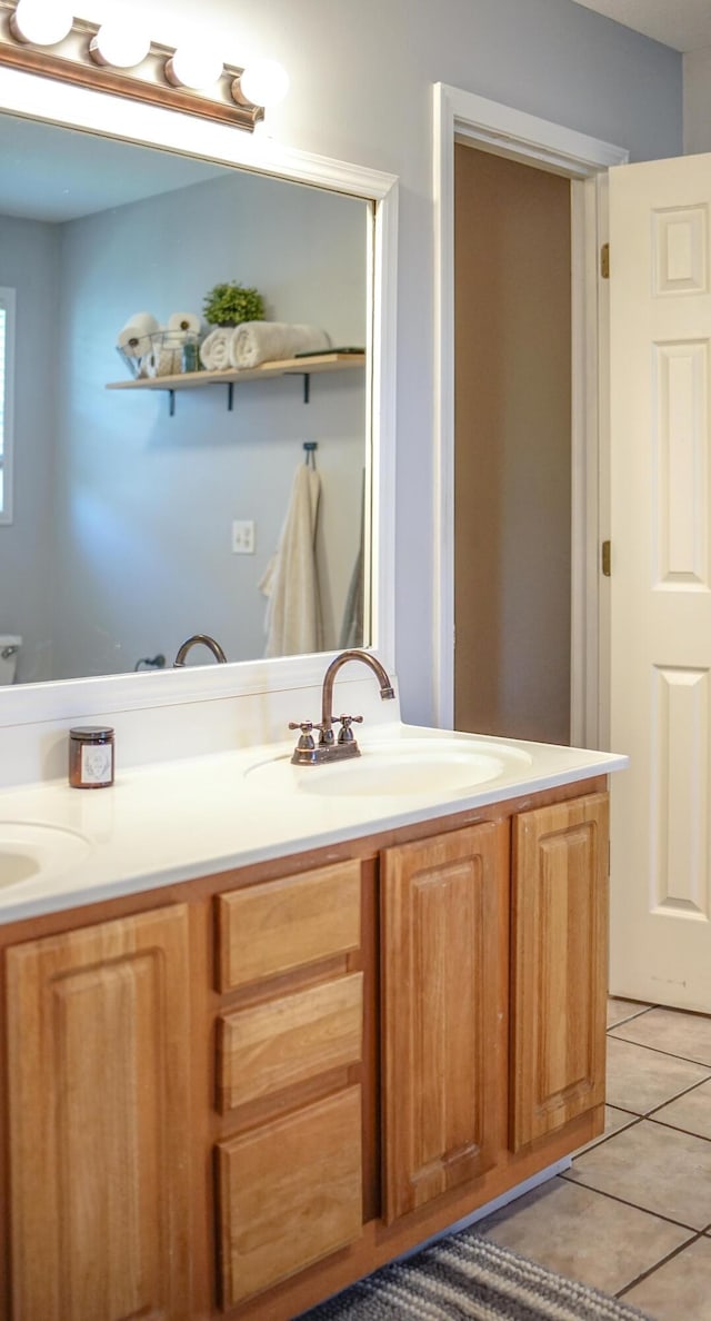 921 Woodhurst Dr, Marshfield, MO 65706 - bathroom with double vanity and tile patterned flooring
