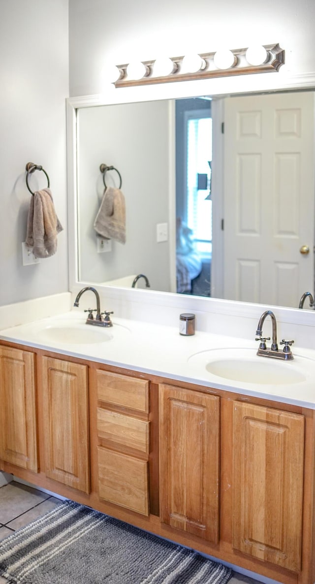 921 Woodhurst Dr, Marshfield, MO 65706 - bathroom featuring double vanity and tile patterned floors