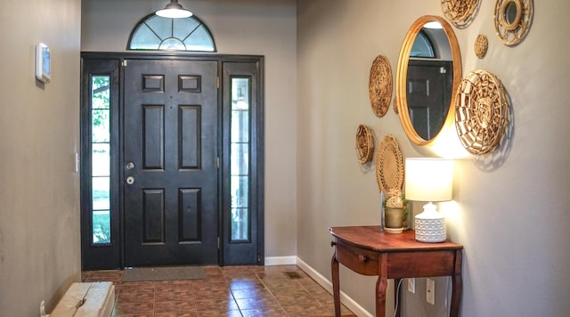 921 Woodhurst Dr, Marshfield, MO 65706 - entryway featuring baseboards and tile patterned floors