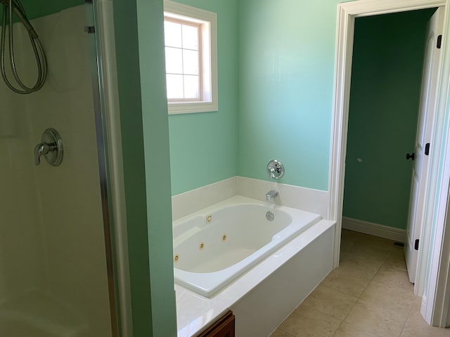 2114 E Finch St, Ozark, MO 65721 - full bathroom with tile patterned flooring, a whirlpool tub, and a shower stall