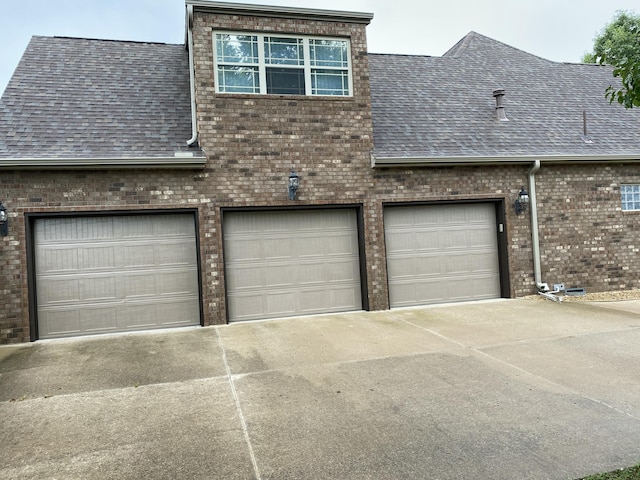 2114 E Finch St, Ozark, MO 65721 - garage with driveway