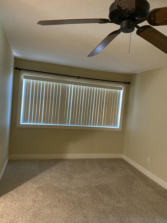 2114 E Finch St, Ozark, MO 65721 - spare room featuring carpet and ceiling fan